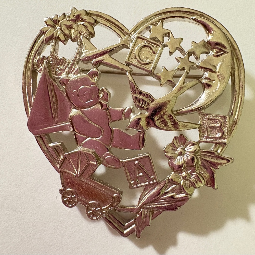 Avon vintage Silvertone “sweet memories” baby Heart Brooch